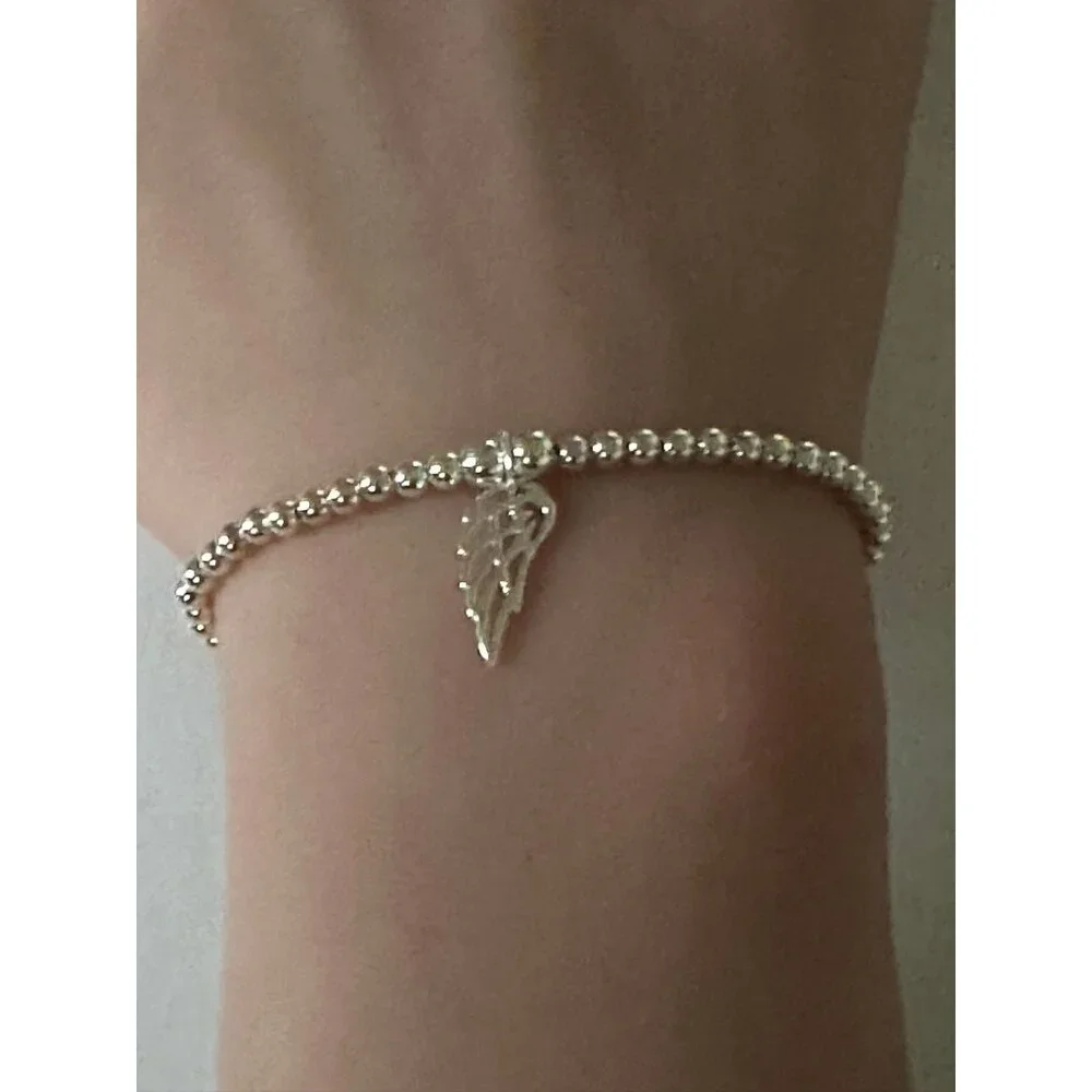 925 Sterling Silver Beaded Stretch Stacking Bracelet Wing Charm Minimalist S7" - Picture 2 of 6